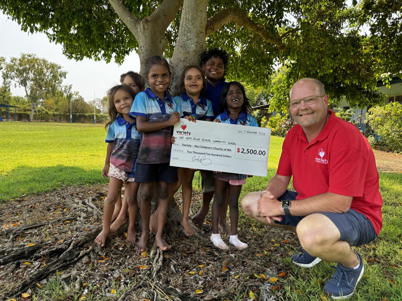 Chris presenting a grant at One Arm Point