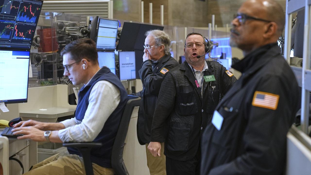Wall St lower on tariff worries, Nvidia and Tesla drop