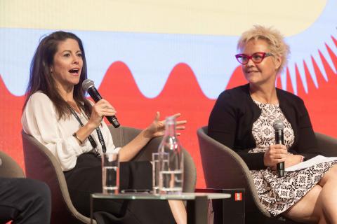 An animated discussion at CyberWest Summit 2025 between Clare Mould and Shana Uhlmann.
