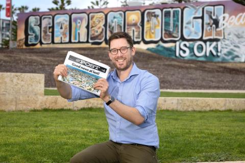 Ben Dickinson with the North Coast Post. Photo: Michael O'Brien