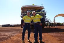 Fortescue's Andrew Forrest and Dino Otranto in front of a hydrogen-powered haul truck at Christmas Creek. Photo: Tom Zaunmayr